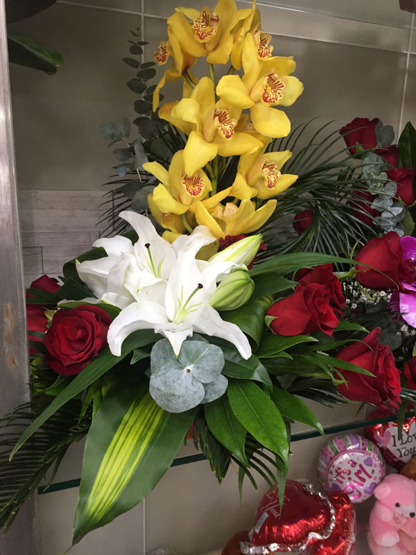 White Lily And Red Rose Flower Arrangement With Eucalyptus